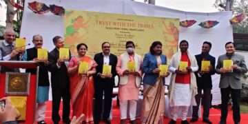 Tribal Affairs Minister Arjun Munda unveiling the book 'Tryst with the Tribes' by TRIFED MD and IAS officer Pravir Krishna