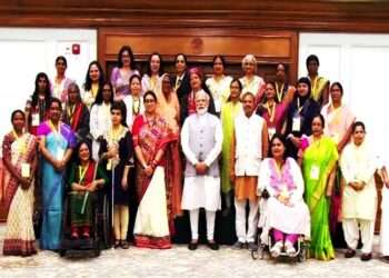 Prime Minister Narendra Modi and Women and Child Development Minister Smriti Irani with Nari Shakti Puraskar winners