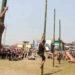 Nagaland Tribal Game | Participants at a greased pole climbing event