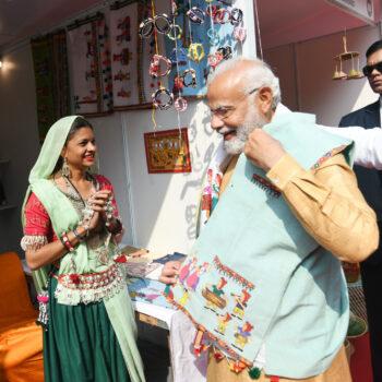 Aadi Mahotsav - PM Trying Out A Jacket AT Aadi Mahotsav