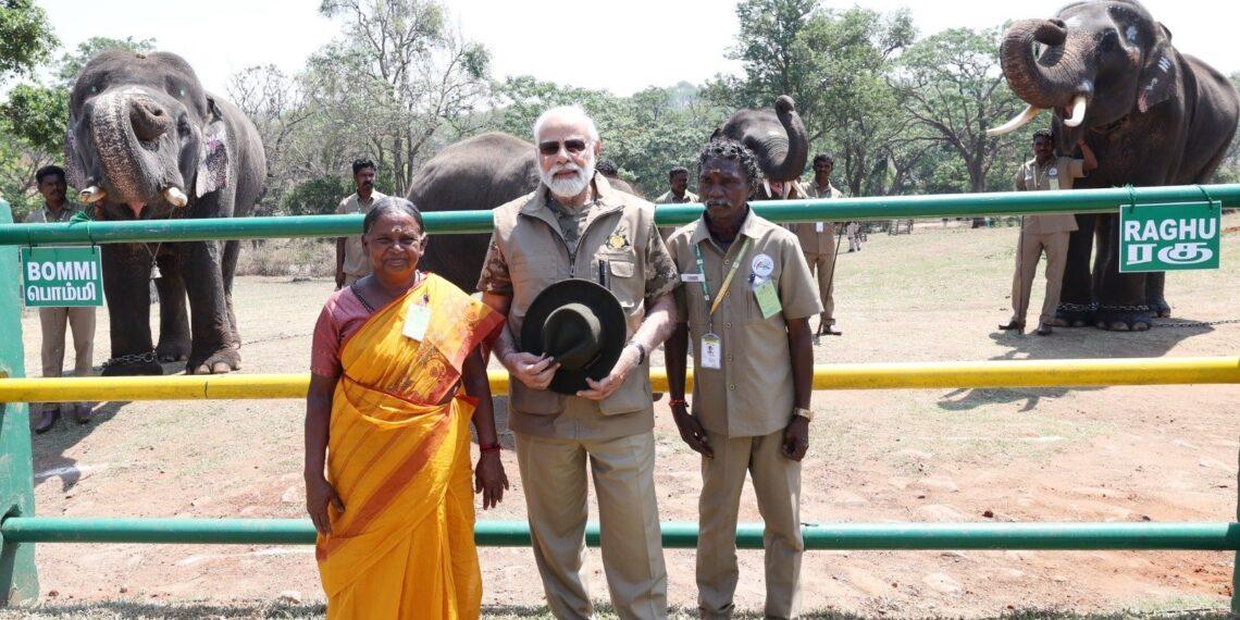 PM Modi With Elephant Caretakers Bomman And Bellie