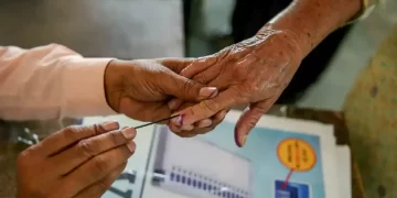 A Voter's Finger Being Inked Before Voting